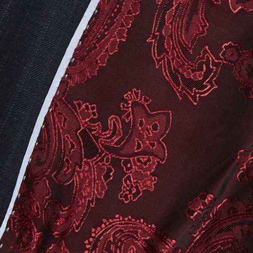 Gros plan d'une doublure jacquard paisley bordeaux