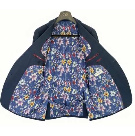 La veste ouverte : doublure fleurie sur fond bleu